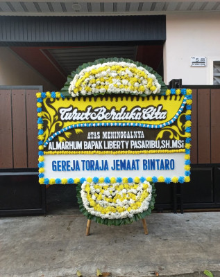 Papan Bunga Duka di Tambelangan